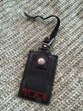 Tumi Black Leather Luggage Tag with Red Logo Accent